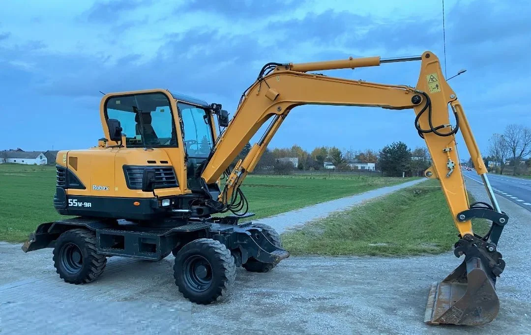 a6-14-4.webp HYUNDAI Robex 55W-9A + 3 Schaufeln – Minibagger 5,5T – Baggerlader – Bild 1
