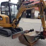 Caterpillar 302.7D CR + 3 SCHAUFELN – Minibagger 2,67T